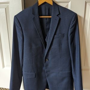 Three piece BLUE Ralph Lauren suit. Jacket is a 40R. Pants are a 32 x 32.